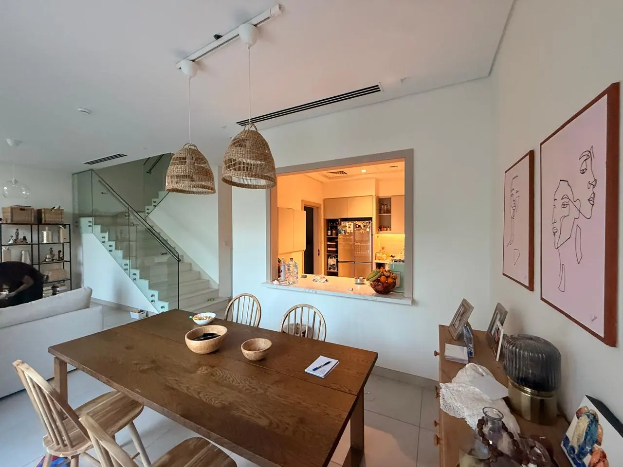 The lived-in townhouse, photo 06, shot on the agent's phone