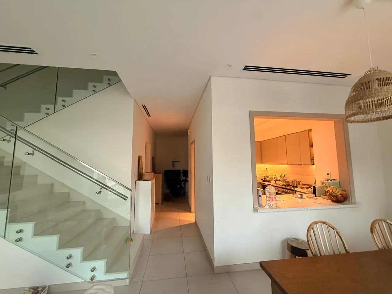 The lived-in townhouse, photo 14, shot on the agent's phone