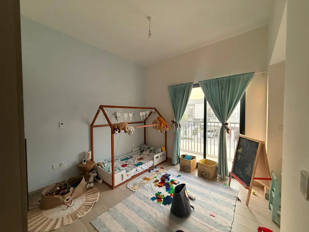 The lived-in townhouse, photo 15, shot on the agent's phone