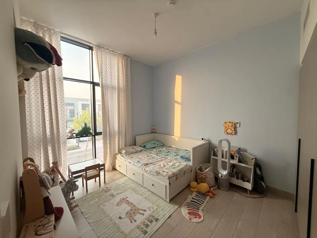 The lived-in townhouse, photo 16, shot on the agent's phone